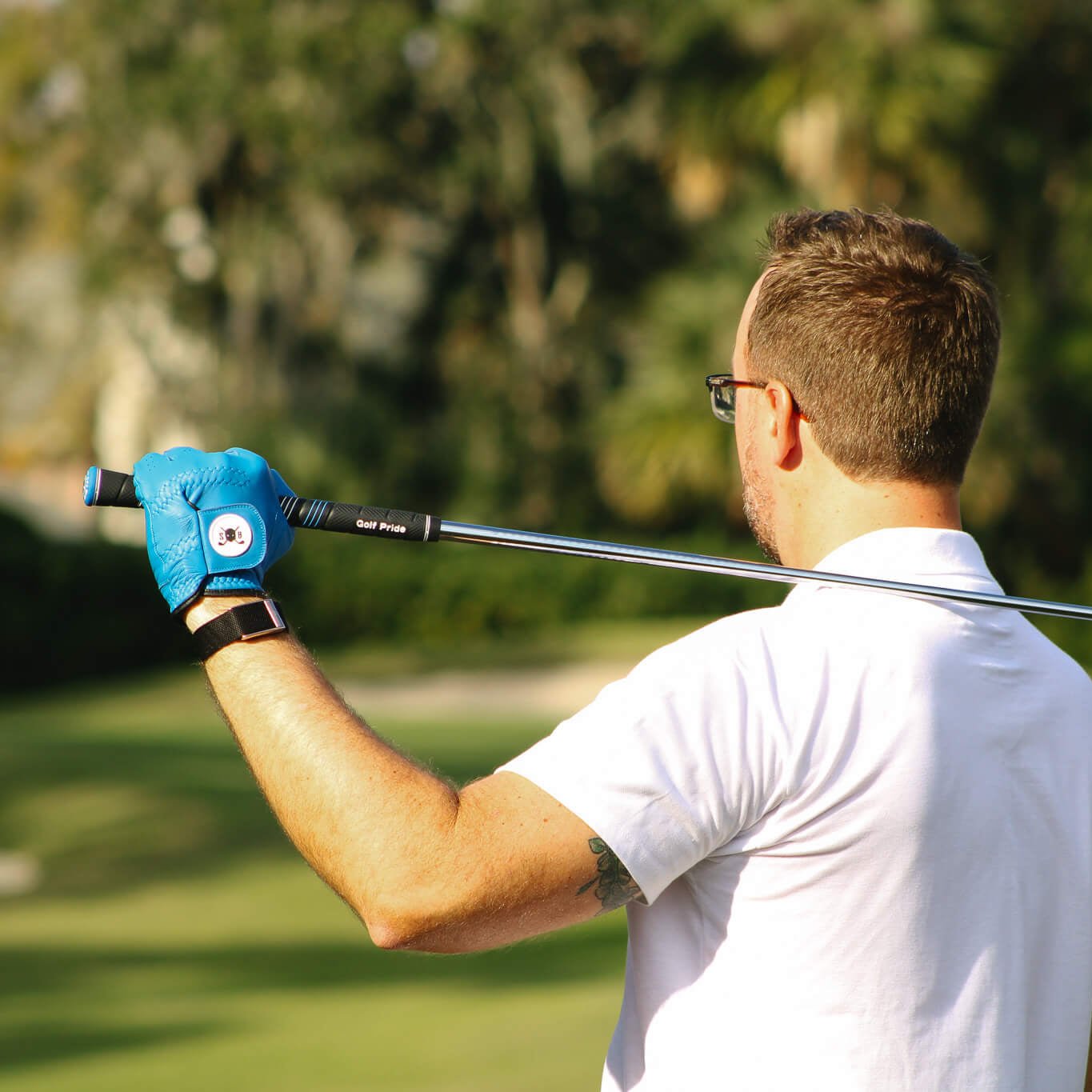 AAA cabretta leather golf glove in stealth blue, palm view showing perforated venting
