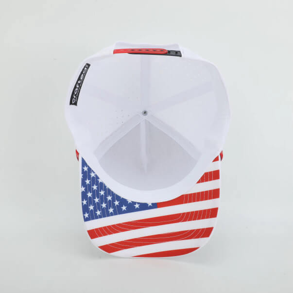 White cap with American flag design on a light gray background