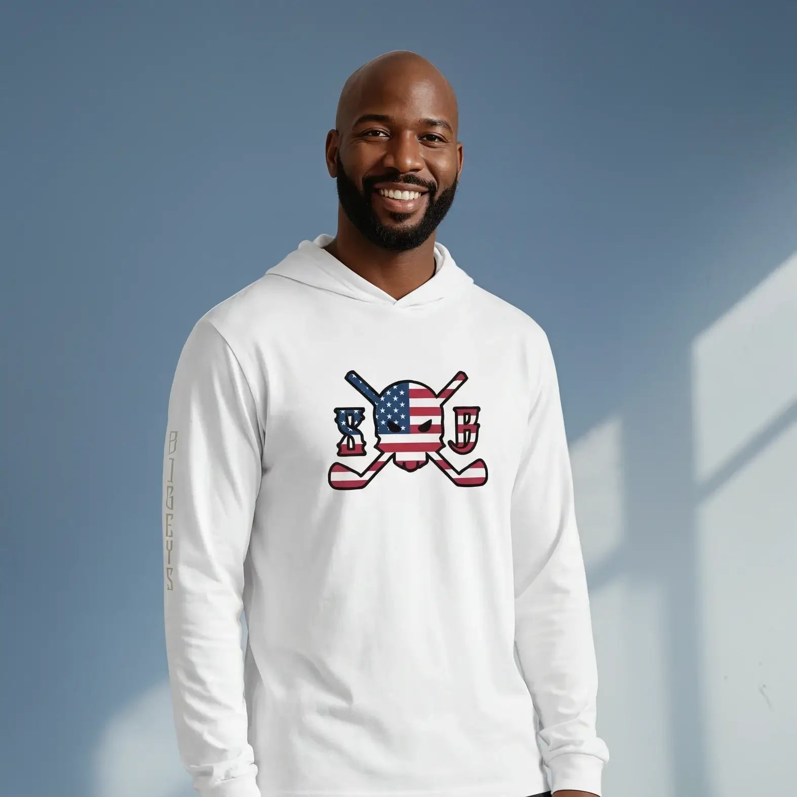 Man wearing a white hoodie with a graphic design on a blue background