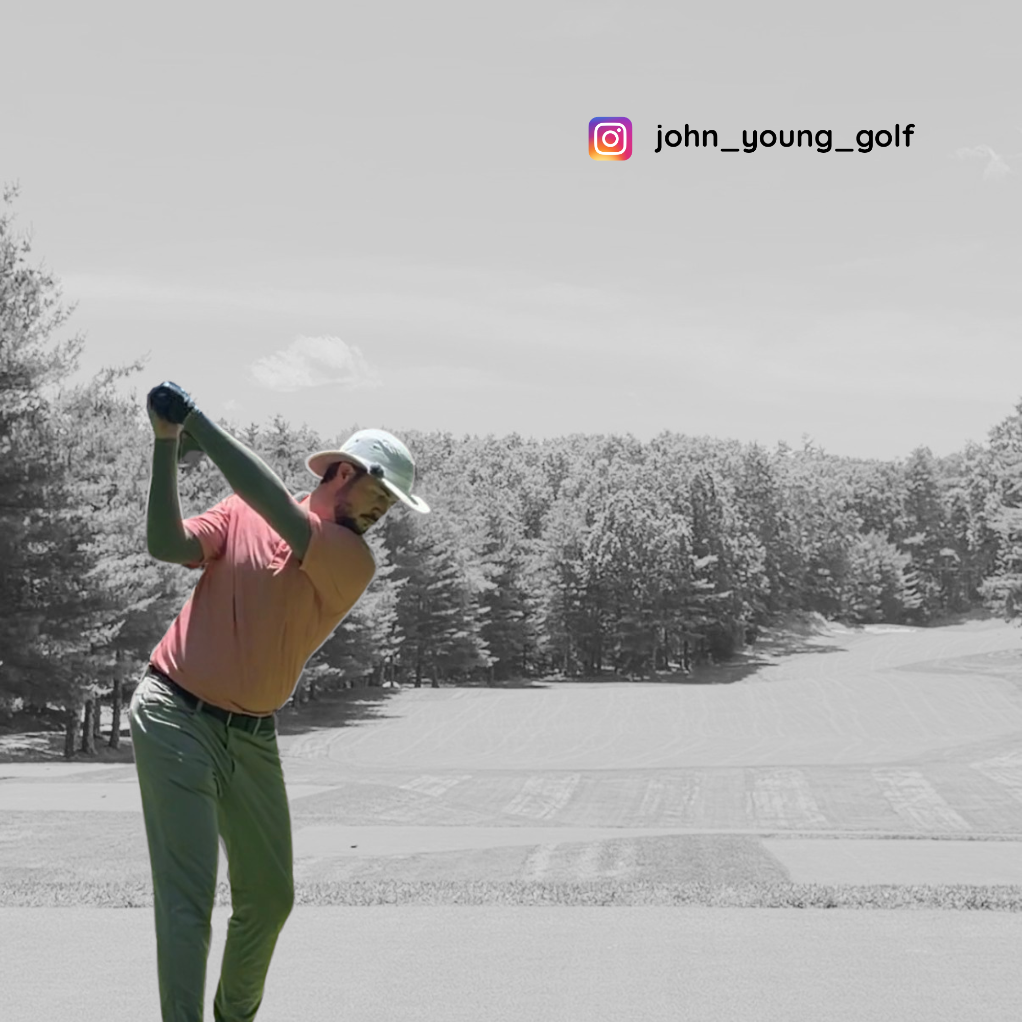 A golfer in a salmon-pink polo shirt, sage green pants, and a white cap is captured mid-swing on a golf course. The background is desaturated in grayscale, while the golfer's clothing remains in color.