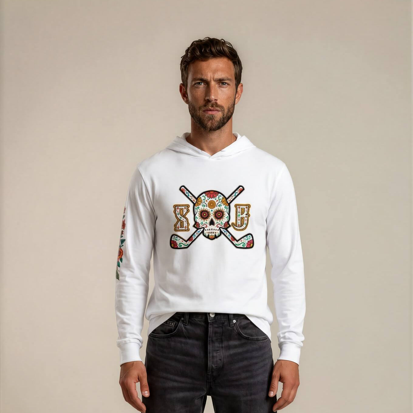 Man wearing a white hoodie with a graphic design on a beige background