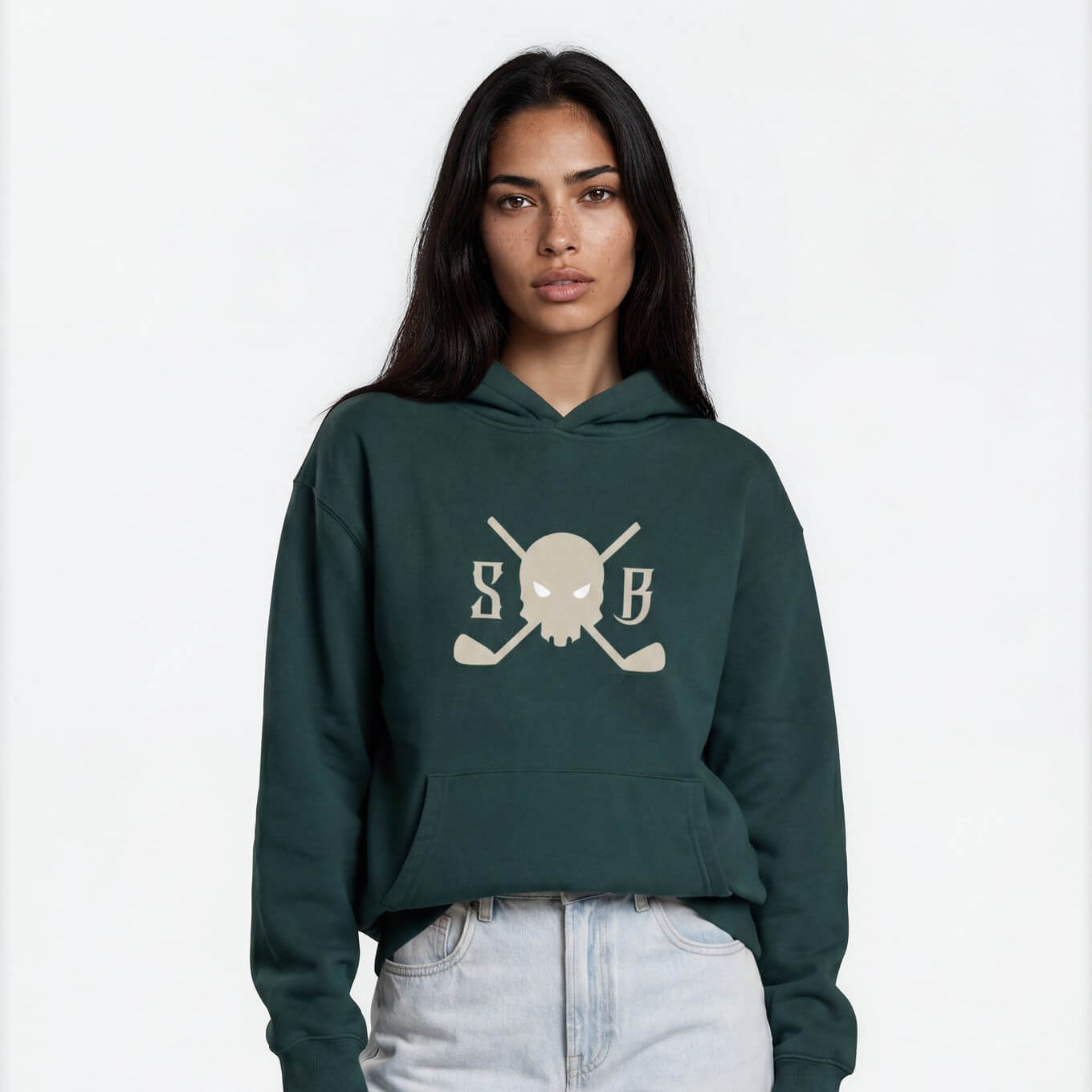 Person wearing a green hoodie with a skull and crossbones design on a white background